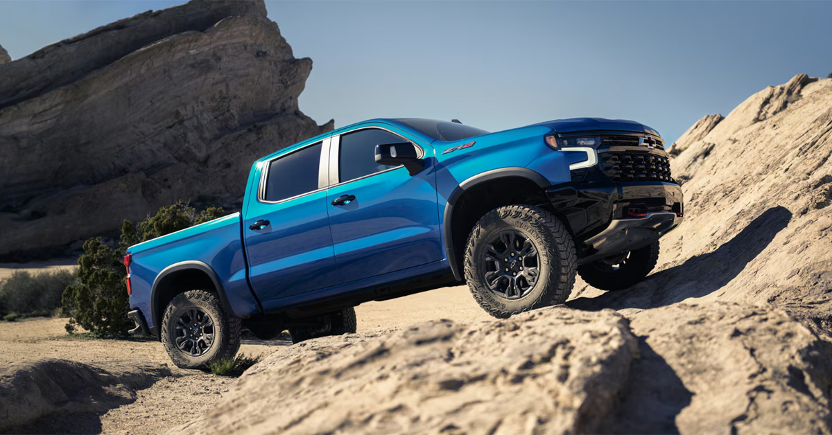 2026 Chevrolet Silverado 1500 rding uphill on a rocky terrain